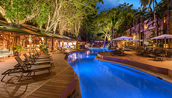 Evening poolside view at Ramada Port Douglas.