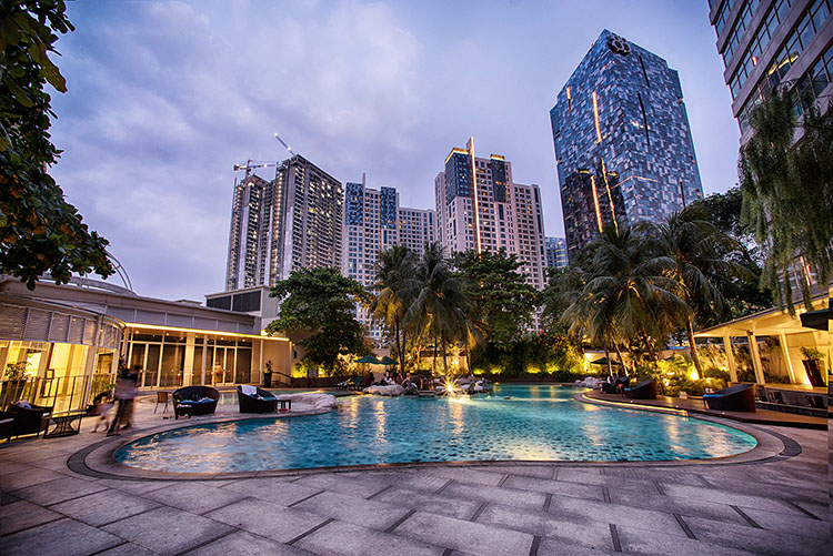 Nighttime poolside view at Wyndham Casablanca Jakarta.